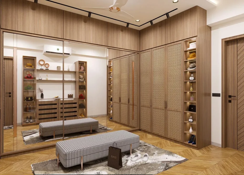 Walk in wardrobe interior in oak and bronze by SMA Architect