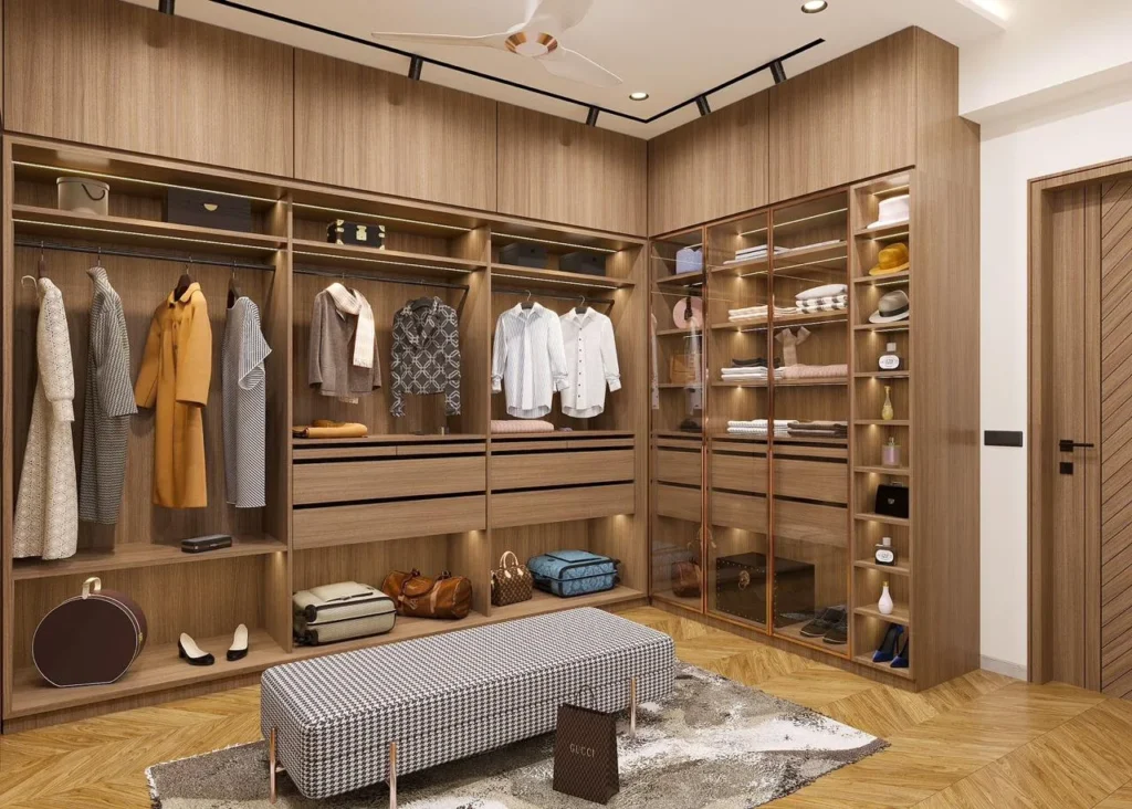 Walk in wardrobe interior in oak and bronze by SMA Architect
